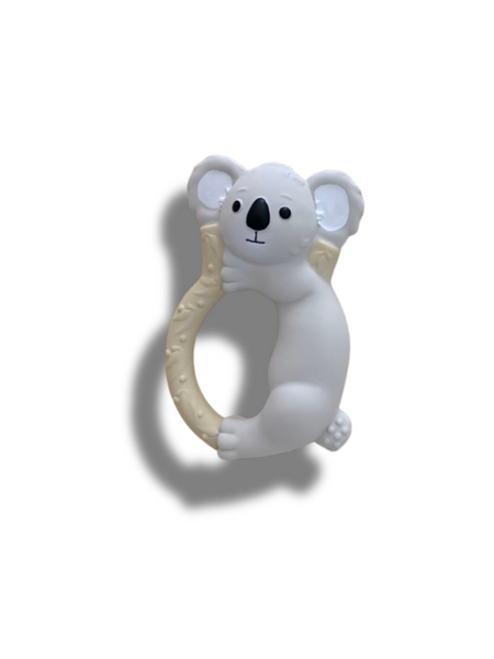A white koala-shaped baby teether or ring toy with a beige textured ring and black facial details, shown on a plain white background with a soft shadow.
